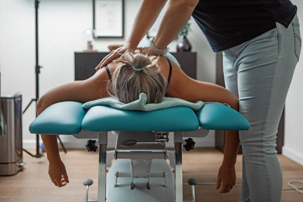 What does a chiropractor do during an adjustment in Dallas?